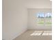 Bedroom with carpet, light walls, large window for natural light at 228 Palomino Way, Clayton, NC 27520