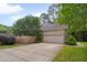 Charming single-Gathering home with a two-car garage, driveway, and beautifully maintained landscaping at 2312 Shallowford Ln, Chapel Hill, NC 27517