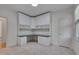 Well-lit home office space with built-in desk and cabinets at 2312 Shallowford Ln, Chapel Hill, NC 27517