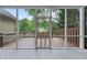 Inviting screened porch with wood flooring and a view of the backyard at 2312 Shallowford Ln, Chapel Hill, NC 27517