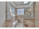 An elegant walk-in shower featuring glass and tile, complete with a built-in bench at 2312 Shallowford Ln, Chapel Hill, NC 27517