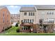The back exterior features a two-story deck overlooking a well-maintained lawn and garden at 2740 Laurelcherry St, Raleigh, NC 27612
