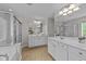 Bathroom boasts a double vanity, a separate shower, and plenty of counter space at 2740 Laurelcherry St, Raleigh, NC 27612