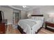 Relaxing primary bedroom with tray ceiling, soft rug, and king bed is a serene retreat at 2740 Laurelcherry St, Raleigh, NC 27612