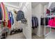 Well-organized walk-in closet with shelving and hanging space, providing ample storage for clothing and accessories at 2740 Laurelcherry St, Raleigh, NC 27612