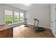 Spacious workout room with a treadmill, stationary bike, and natural light at 2740 Laurelcherry St, Raleigh, NC 27612