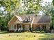 Charming single-Gathering home featuring dormer windows and a landscaped front yard at 301 Monterey Ct, Benson, NC 27504