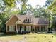 Charming single-Gathering home featuring dormer windows and a landscaped front yard at 301 Monterey Ct, Benson, NC 27504