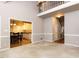 Open floor plan with a view of the staircase and a glimpse into the kitchen at 301 Monterey Ct, Benson, NC 27504