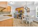 Eat-in kitchen with stainless steel appliances, backsplash, and a table with seating at 303 Sylvias Ct, Durham, NC 27703