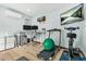 Versatile bonus room set up as a home office and gym area for fitness and work at 303 Sylvias Ct, Durham, NC 27703