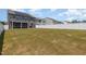 Large, grassy backyard enclosed by a white fence, offering ample outdoor space at 311 Horseshoe Pl, Angier, NC 27501