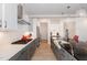 Well-equipped kitchen with stainless steel appliances, modern fixtures, and ample counter space at 311 Horseshoe Pl, Angier, NC 27501