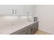 A well organized pantry area with cabinets and countertops at 311 Horseshoe Pl, Angier, NC 27501