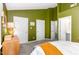 Bright bedroom with carpeted floors and access to two closets at 318 Silverberry Ct, Cary, NC 27513