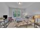 Cozy bedroom with a comfortable bed, soft lighting, and a serene ambiance for restful nights at 325 Buckhorn Branch Park, Clayton, NC 27520