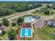 Aerial view of the community pool, playground, and tennis court near the neighborhood at 325 Buckhorn Branch Park, Clayton, NC 27520