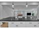 Kitchen island offering seating and a view into an adjoining living room at 325 Buckhorn Branch Park, Clayton, NC 27520