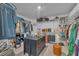 Spacious walk-in closet with custom shelving, drawers, and ample storage for clothing and accessories at 325 Buckhorn Branch Park, Clayton, NC 27520