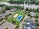 Aerial view of the community with tennis and sand volleyball courts at 327 Commons Walk Cir, Cary, NC 27519