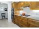 Well-equipped kitchen features modern appliances, ample counter space, and a convenient cooktop for culinary enthusiasts at 3285 Edinburgh Dr, Sanford, NC 27332