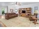 Spacious living room boasts custom built-in shelving and a comfortable seating area at 3285 Edinburgh Dr, Sanford, NC 27332