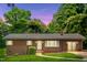 Charming ranch home with a well-maintained lawn and a cozy, inviting entrance at 330 Wilmot Dr, Raleigh, NC 27606
