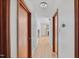 Hallway featuring hardwood floors and paneled doors at 330 Wilmot Dr, Raleigh, NC 27606