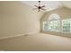 Spacious upstairs bedroom features a vaulted ceiling, ceiling fan and plenty of natural light at 3728 Westbury Lake Dr, Raleigh, NC 27603