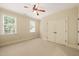 Inviting bedroom with natural light, neutral carpet, and a spacious closet at 3728 Westbury Lake Dr, Raleigh, NC 27603
