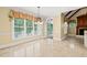 Inviting breakfast nook with tile floors, natural light, and outdoor access at 3728 Westbury Lake Dr, Raleigh, NC 27603