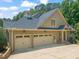 Spacious three-car garage offers ample parking and storage space at 3728 Westbury Lake Dr, Raleigh, NC 27603