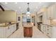 Gourmet kitchen with granite countertops, stainless steel appliances, and center island at 3728 Westbury Lake Dr, Raleigh, NC 27603