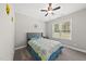 Charming bedroom with a decorative bedspread and a sun-filled window view at 374 Heart Pine Dr, Wendell, NC 27591