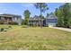 Two story home with two car garage, situated on a grassy lawn at 374 Heart Pine Dr, Wendell, NC 27591