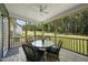Covered porch including a table, chairs, and a view to the backyard at 374 Heart Pine Dr, Wendell, NC 27591