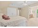 A bedroom with a comfortable bed, closet, and bathroom access; perfect for relaxing after a long day at 3806 Lochnora Pkwy, Durham, NC 27705