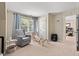 Cozy bedroom featuring a comfortable chair, bright windows and lots of space for activities at 3806 Lochnora Pkwy, Durham, NC 27705