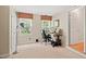 Office with natural lighting and two large windows at 3806 Lochnora Pkwy, Durham, NC 27705