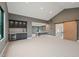 Finished basement featuring a bar with marble countertop, plus a large open area at 4 Rainforest Pl, Apex, NC 27523