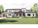 Beautiful two-story home with a landscaped front yard and a mix of stone and siding exterior at 4 Rainforest Pl, Apex, NC 27523
