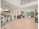 Expansive open-concept living space features hardwood flooring and seamlessly connects the dining and seating areas at 4 Rainforest Pl, Apex, NC 27523