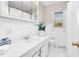 Bright bathroom with a pristine white vanity, toilet, a medicine cabinet, and a shower with a curtain at 4536 Massey Rd, Zebulon, NC 27597