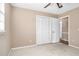 Comfortable bedroom with a closet offers ample storage space, paired with neutral walls and carpet at 4536 Massey Rd, Zebulon, NC 27597