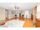 Cozy living room with views of the front yard and hardwood floors at 4536 Massey Rd, Zebulon, NC 27597