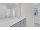 Bathroom featuring a large mirror and a sink with cabinet storage below at 520 Oak Holly Ln, Zebulon, NC 27597