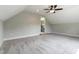 Attic bonus room featuring recessed lights, ceiling fan, and dormer entrance at 550 Spring Flowers Dr, Cameron, NC 28326