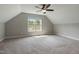 Attic bonus room featuring recessed lights, ceiling fan, and natural light at 550 Spring Flowers Dr, Cameron, NC 28326