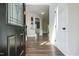 Inviting foyer showcasing hardwood floors and an open floor plan with modern finishes at 550 Spring Flowers Dr, Cameron, NC 28326