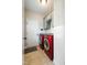 Laundry room with modern machines, tiled floor and subway-tiled backsplash at 550 Spring Flowers Dr, Cameron, NC 28326